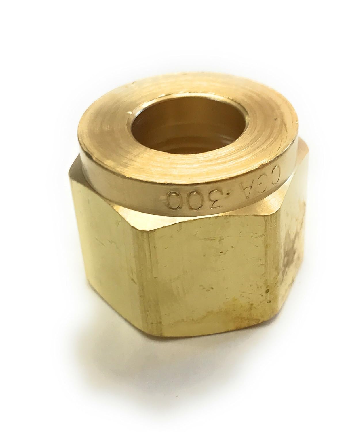 CGA-300 Hex Nut for Acetylene Gas Service by Western Enterprises, detailed view showcasing the hexagonal shape and brass material finish.